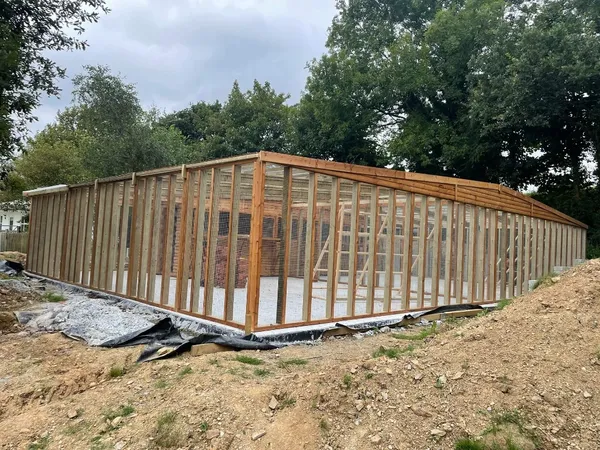 Full Height Aviary Pent combi-loft with aviary section and enclosed loft, on block base