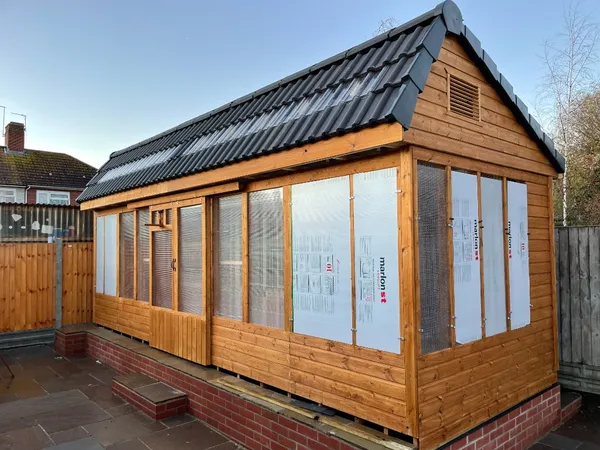 Newly installed apex stock loft with protective film still on the polycarbonate sliding panels