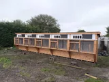 The Ultimate Pent Pigeon Loft with mesh aviary section and solid door on raised base