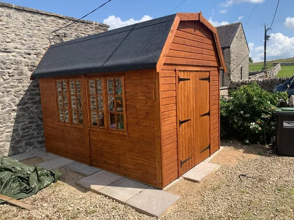Dutch Barn shed with double doors, multi-pane windows and high-level gable window