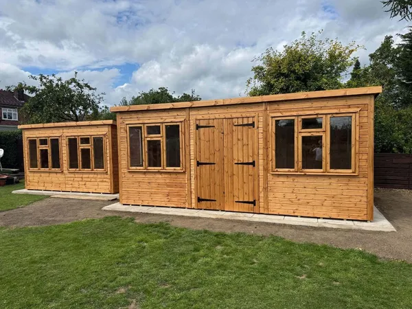 Large bespoke pent workshop with custom window and door layout