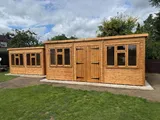Large bespoke pent workshop with custom window and door layout