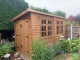 A compact modern pent workshop perfect for smaller garden spaces
