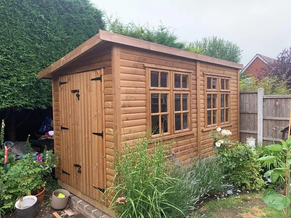 A compact modern pent workshop perfect for smaller garden spaces